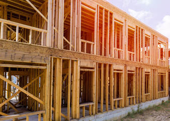 Obraz premium Wood Building frame at Multi-Family Housing Construction