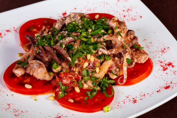 Tomato and squid salad
