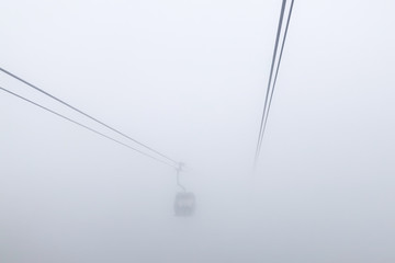 ngong ping cable car hong kong china in the rainy season and fog - Powered by Adobe