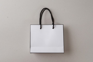 white shopping bag one white background and copy space for plain text or product