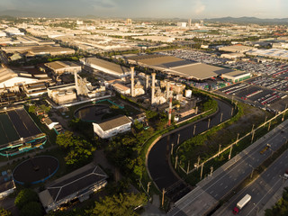 Aerial view of chemical oil refinery plant, power plant at sunset sky for industry concept.
