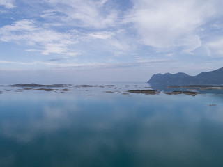 Aerial view of an ocean with little islands