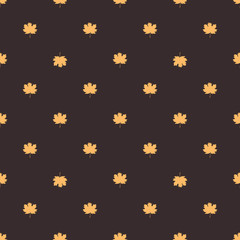 Seamless pattern with autumn maple leaves.  Golden yellow leaves on dark background. Vector illustration