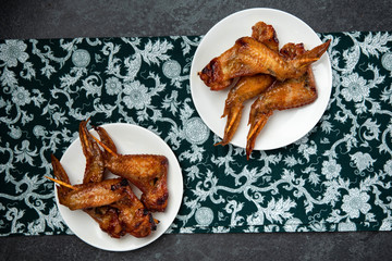 grilled chicken bbq Thai street food style with Thai pattern fabric