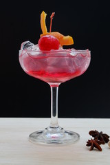 red daiquiri cocktail on wooden background