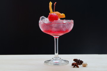 red daiquiri cocktail on wooden background