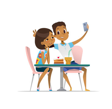 African-American girl and boy meeting at the cafe a and taking selfie. Teenagers friends at the restaurant taking photo on phone. Smiling students having coffee-break and taking self-portrait.