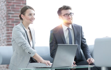 members of the business team talking to a client