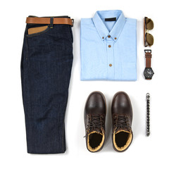 Men's casual outfits for man clothing with brown boot , watch, blue jeans, belt, wallet, sunglasses, office shirt and bracelet isolated on white background, Top view