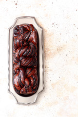 Yeast cake with chocolate and hot coffee