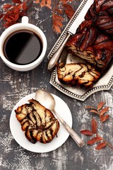 Yeast cake with chocolate and hot coffee