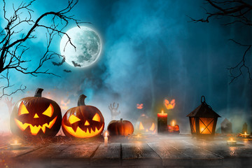 Halloween pumpkins on old wooden planks.