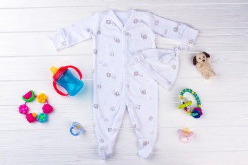 Set of baby clothes and necessities. © margostock