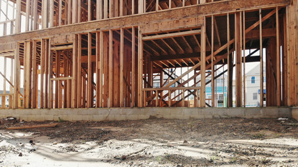 Building of New Home Construction exterior wood beam construction