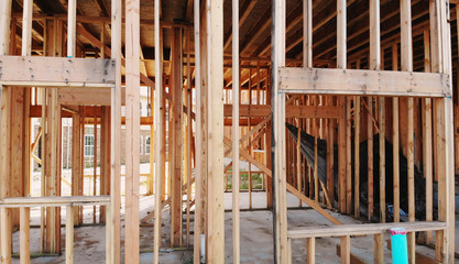 New building unfinished outside the wood frame and beam construction