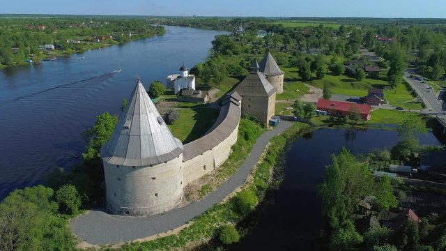 Flight over the old Ladoga fortress on a Sunny may day (aerial video). Staraya Ladoga, Russia