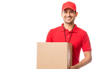 Worker Smiling While Carrying Parcel Over White Background