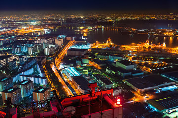 Fototapeta na wymiar Aerial view of the Osaka Bay harbor area at night