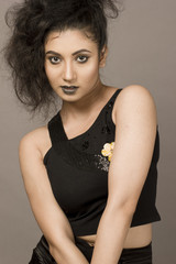 pretty female model in black skirt