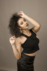 pretty female model in black skirt