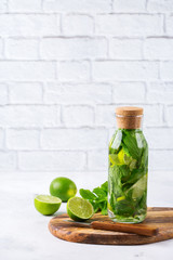 Fresh cool lemon lime mint infused water detox drink