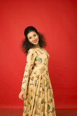 beautiful indian female model in beige dress