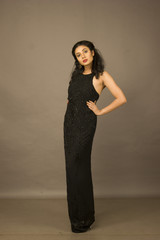 beautiful indian female model in a black gown