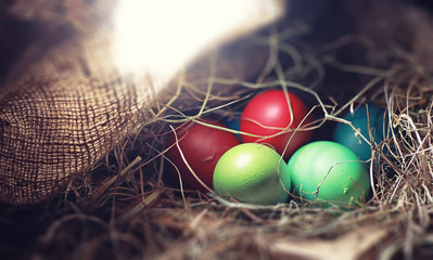 Easter painted eggs on burlap