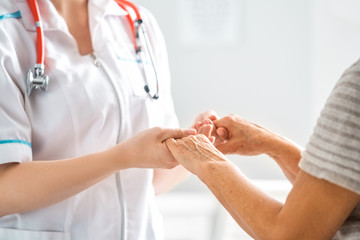 Female patient listening to doctor