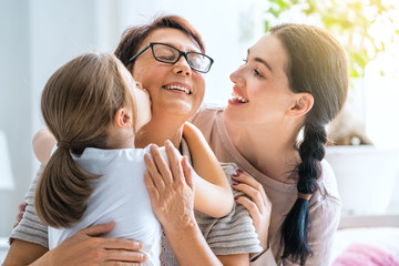 girl, her mother and grandmother