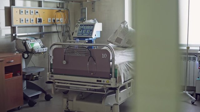 Bed in ICU ward near window