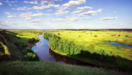 View from the hill to the river in the green valley