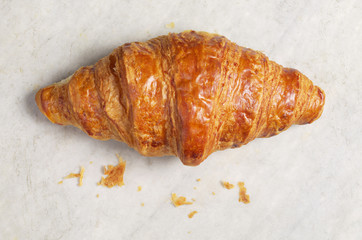 Croissant on a white marble