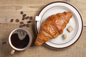 Coffee and fresh croissant