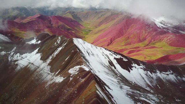Aerial panoramic view of  colourful Vinicunca, Rainbow Mountain, Peru.