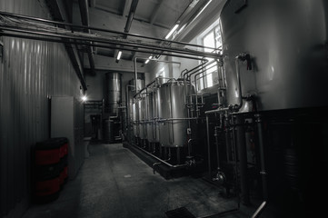 Naklejka na ściany i meble Vessel equipment and stainless steel machines. Modern brewery