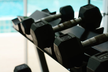 exercise weights iron dumbbell as background