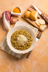 chicory risotto with curcuma and scamorza cheese