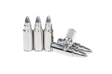 Close up of silver bullets in a row, isolated on white