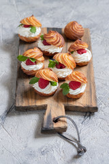 Raspberries Profiteroles with White Chocolate Cream