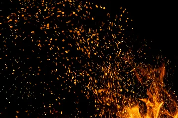 Crédence de cuisine en verre imprimé Flamme Fire sparks with flames on black background