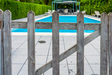 Wooden protection fence at the pool.