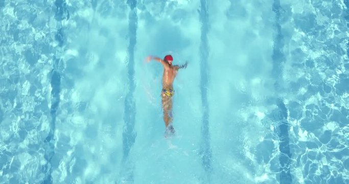 Triathlon athlete swimming workout in the swimming pool outdoor