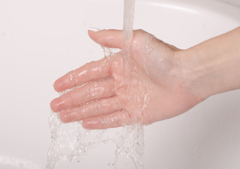 Soapy hands water faucet bathroom disinfection care