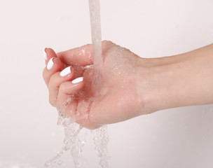 Fototapeta premium Soapy hands water faucet bathroom disinfection care