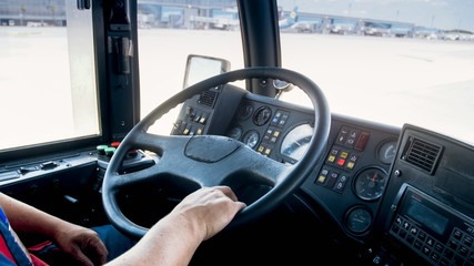 View from the cabin of man driving heavy truck on parking of logisitcs center