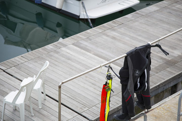 Naklejka premium .image with detail of diving equipment photographed on the pier of the port