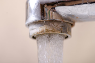 home tap water rust, scale at the end of the tap