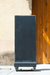 Large blank billboard on a street wall, banners with room to add your own text