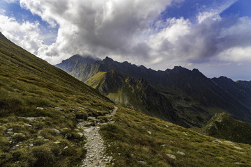 Landscape with rocky mountain peaks in summertime